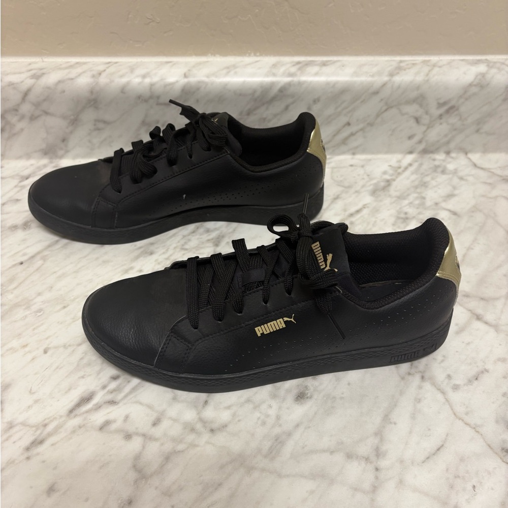 Women’s Puma Black Sneaker with Gold Accent
